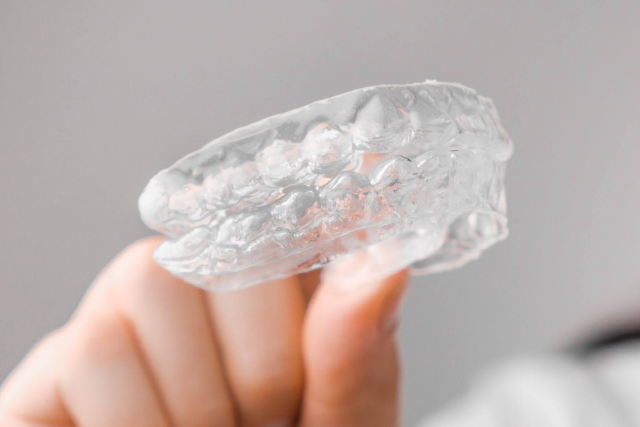 Thinking About Invisalign? What To Know Before Starting Clear Aligners